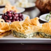 our spanakopita and marinated olives
